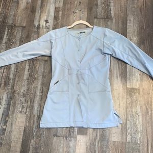 XXs wonder wink form fitting scrub jacket.